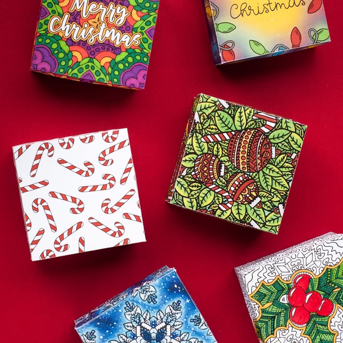 DIY Christmas paper gift boxes – 6 printable coloring templates to make your own gift boxes for a Christmas gift | Find more Christmas printable activities and coloring pages at www.sarahrenaeclark.com/christmas