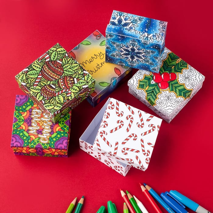 DIY Christmas paper gift boxes – 6 printable coloring templates to make your own gift boxes for a Christmas gift | Find more Christmas printable activities and coloring pages at www.sarahrenaeclark.com/christmas