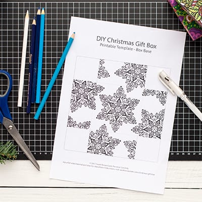 How to make a Christmas paper gift box - Base step 1 - Get the template at www.sarahrenaeclark.com/christmas-gift-box