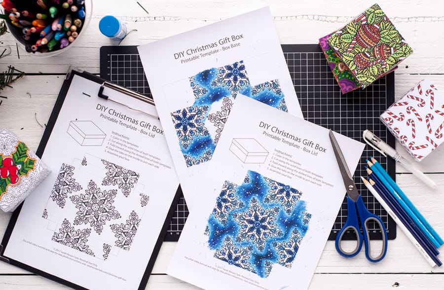 Make a paper gift box for Christmas with this template and tutorial by Sarah Renae Clark. There are 6 different designs to color in! What a great DIY Christmas gift | Check it out at https://sarahrenaeclark.com/christmas-gift-box