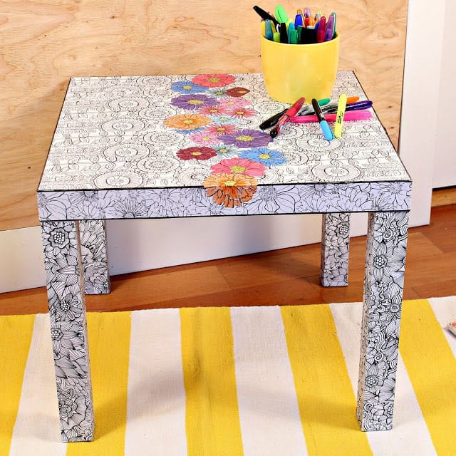 an adult coloring book ikea table hack! | Click to see all 29 creative ways to repurpose your coloring pages | #coloringpage #crafts www.sarahrenaeclark.com