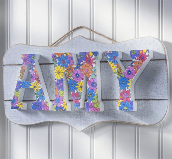 Create a DIY name plaque with a coloring page | Click to see all 29 creative ways to repurpose your coloring pages | #coloringpage #crafts www.sarahrenaeclark.com