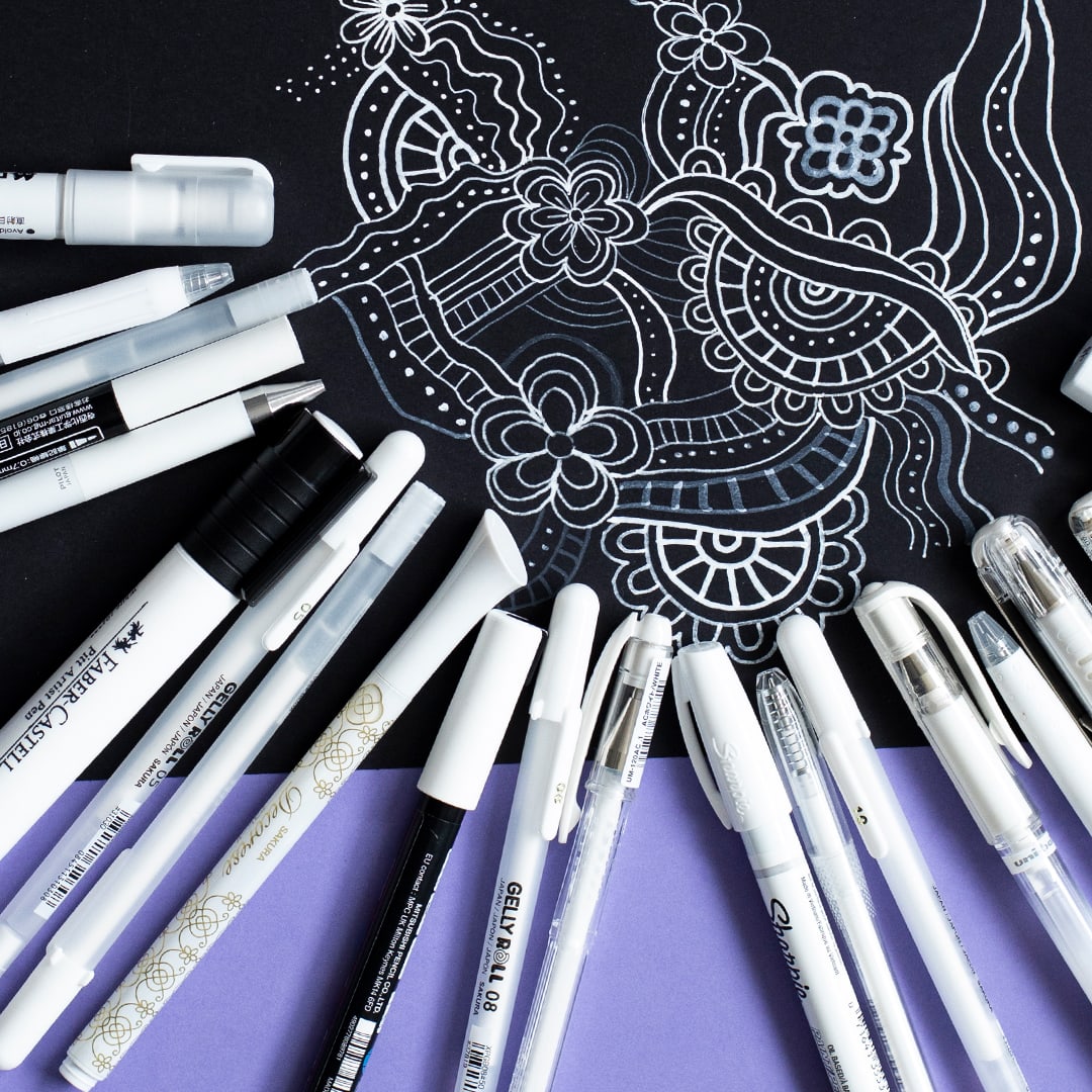 White gel pens and paint markers