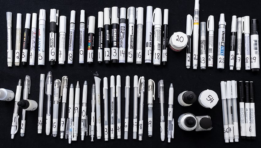 61 White Pens lined up ready to be tested