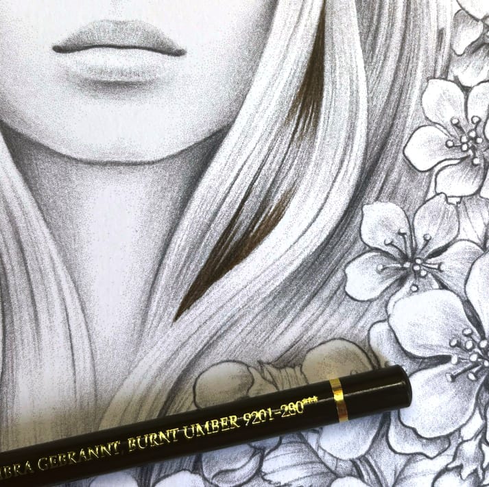first strokes of coloring hair using burnt umber faber-castel polychromos colored pencil in the coloring book.