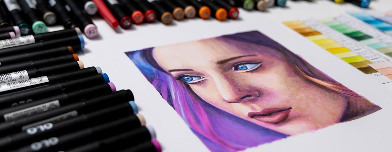 girl drawing with OLO alcohol markers girl drawing with OLO alcohol markers