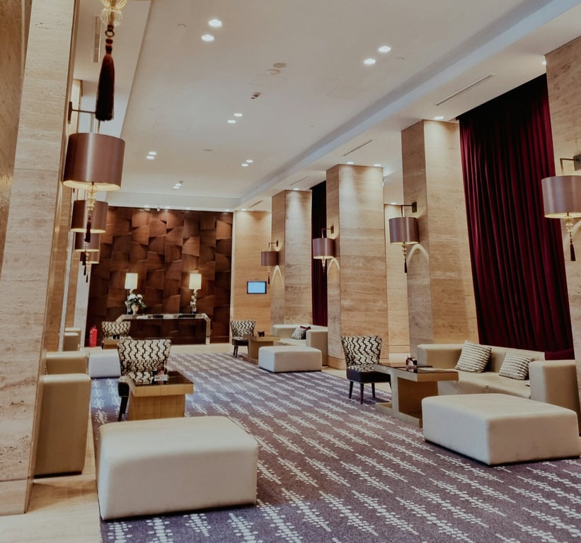 Bright hotel lobby with lounge seating