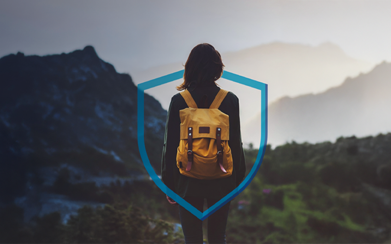 Traveler in nature symbolizing secure health insurance coverage