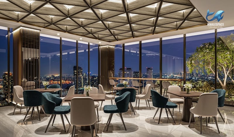 Rooftop dining area with elegant seating and breathtaking night views of the illuminated city