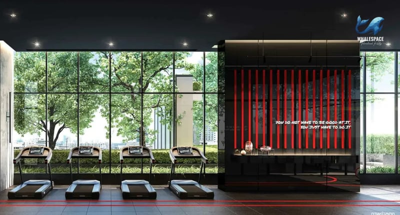 State-of-the-art fitness center with treadmills and motivational wall art