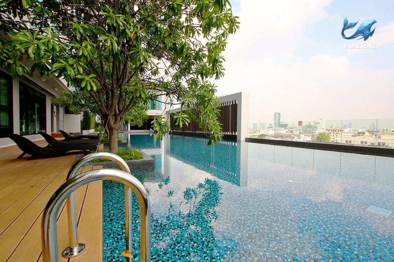 Stunning rooftop infinity pool offering panoramic city views and a serene ambiance.