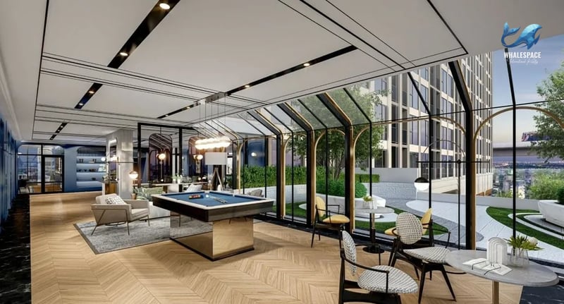 Recreation room featuring a billiards table and lounge seating, with expansive glass windows offering city views.