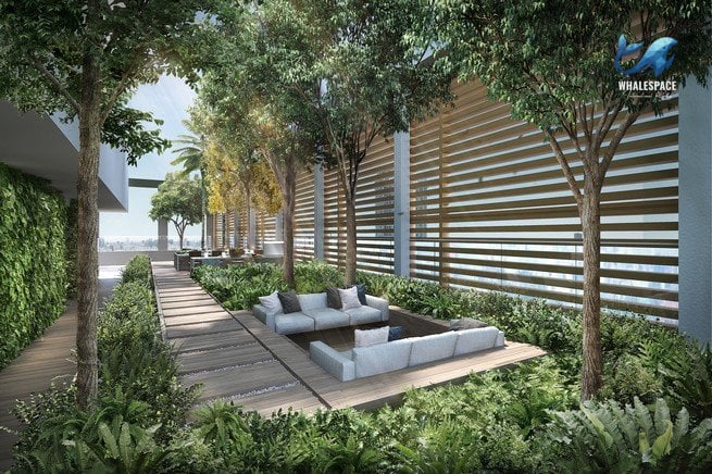 Serene rooftop garden with lush greenery and comfortable seating areas