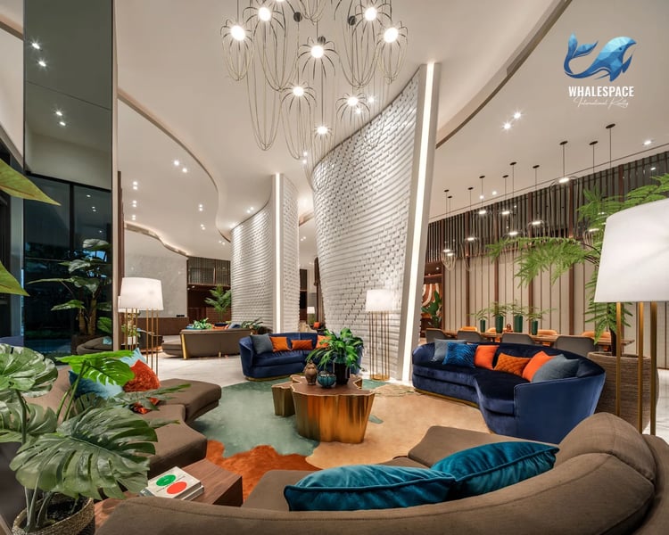 Luxurious lobby with contemporary furniture, artistic lighting, and lush indoor plants.