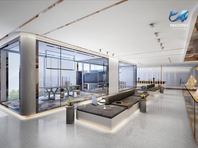 Elegant co-working space with glass partitions, modern furniture, and warm ambient lighting