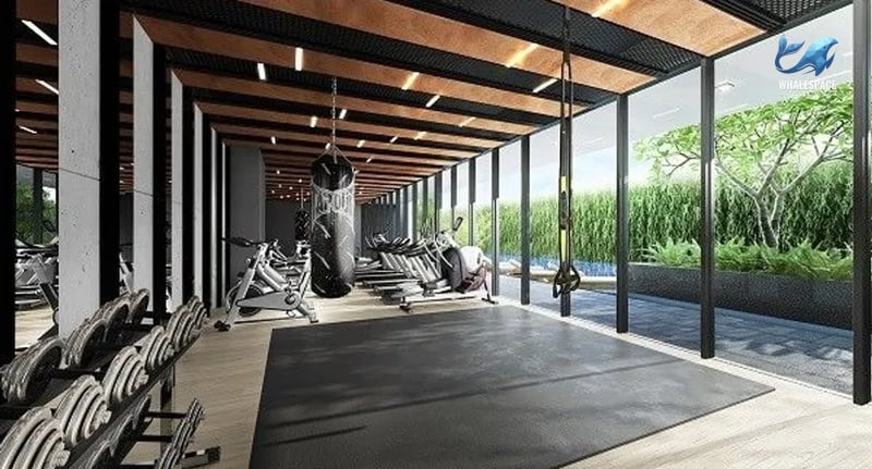 State-of-the-art fitness center with cardio machines, weightlifting equipment, and a boxing station.