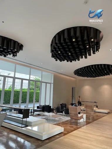 Elegant lobby with modern seating and striking circular light fixtures