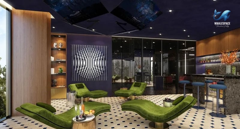 Chic lounge area with vibrant green chaise lounges and a sophisticated bar