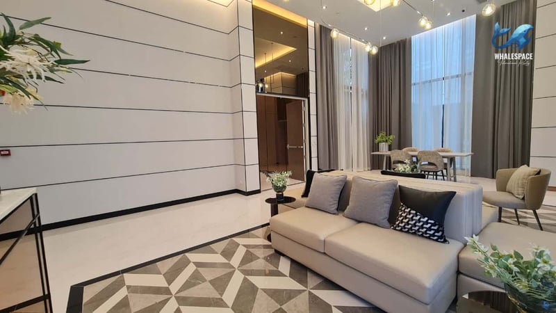 Stylish reception area featuring contemporary design and plush seating