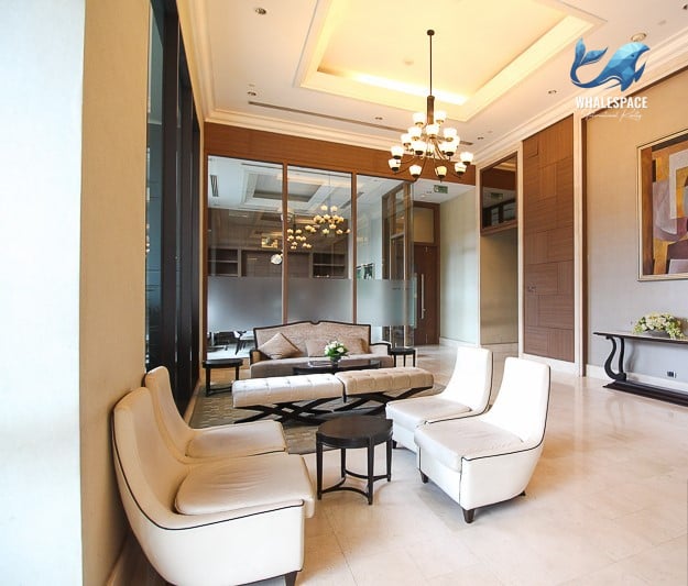 Elegant resident lounge with classic furniture and rich finishes