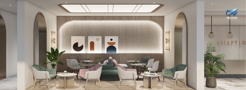 Stylish lounge area with comfortable seating and contemporary artwork, creating a welcoming ambiance.