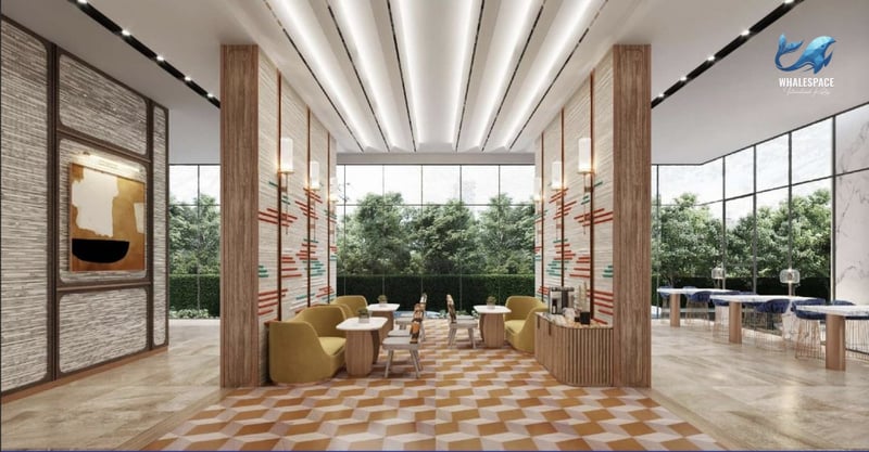 Inviting lounge area with mustard yellow seating, patterned floor, and garden views