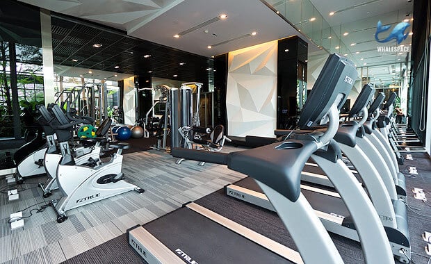 Well-equipped fitness center with various cardio and strength training machines