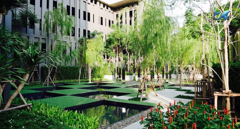 Manicured garden with water features and lush greenery