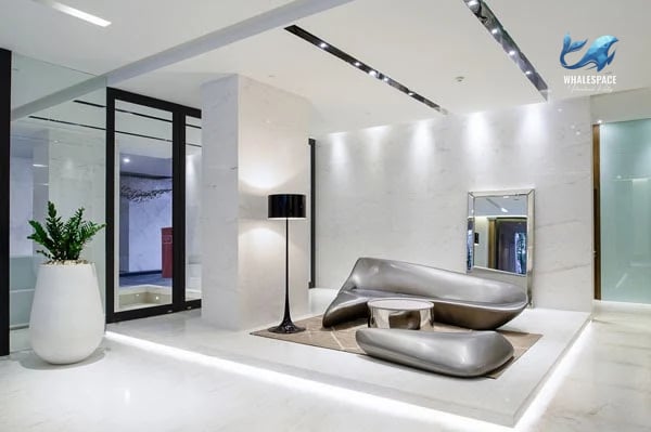 Luxurious lobby with unique sculptural seating and marble finishes