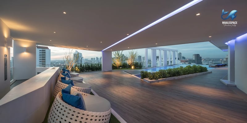 Rooftop lounge area with ample seating and city views