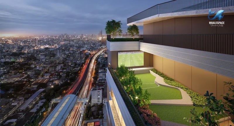Rooftop garden terrace with seating areas and city views, adjacent to an outdoor sports court.