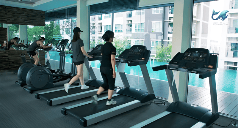 State-of-the-art fitness center overlooking the swimming pool