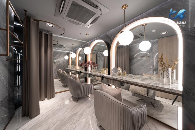 Luxurious vanity area with marble counters, arched mirrors, and soft lighting
