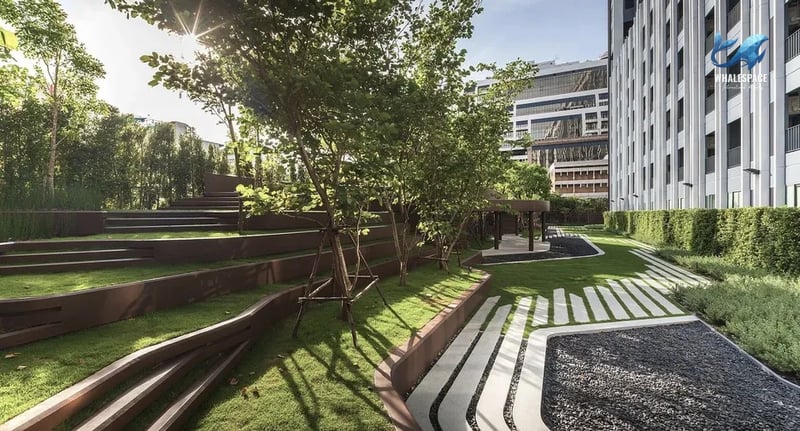 Tiered green landscape with mature trees and modern pathways