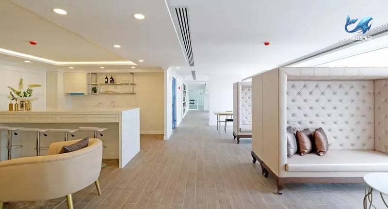Elegant lounge area with plush seating and a modern bar
