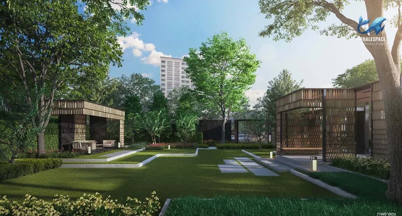 Lush green garden with modern pavilions and serene outdoor seating areas