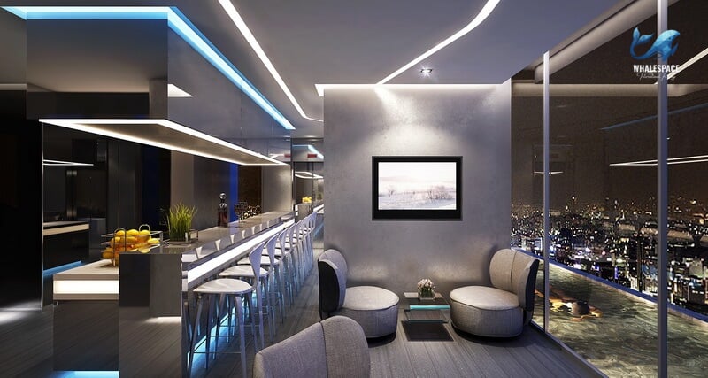 Modern sky lounge with a long, illuminated bar counter, comfortable grey seating, and expansive city skyline views at night.