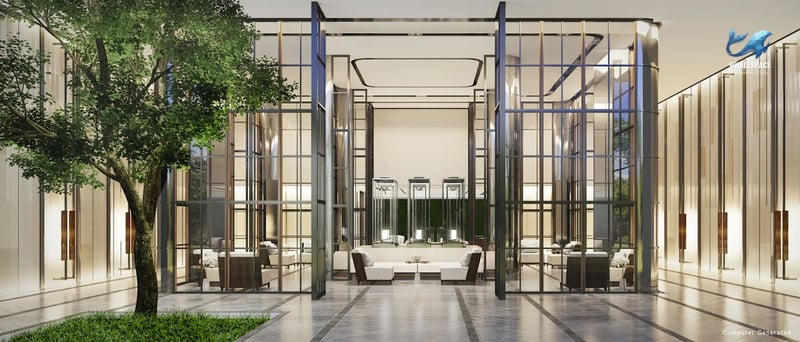 Grand and sophisticated lobby with high ceilings, modern seating, and abundant natural light filtering through expansive glass panels.