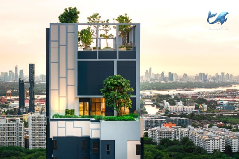 Architectural detail of a modern high-rise building with a lush sky garden and a panoramic city and river view.