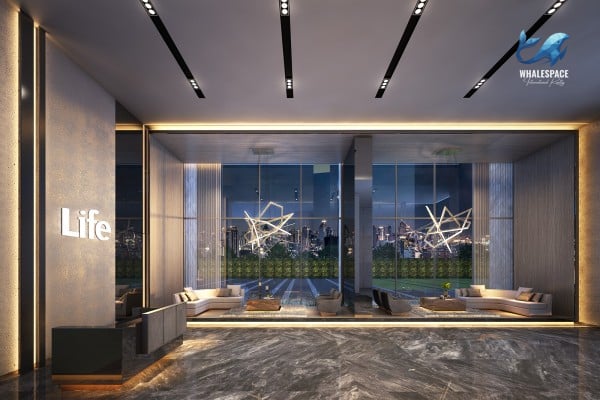 Grand and spacious lobby area featuring a sleek reception desk, dark marble floors, and stylish lounge seating with contemporary lighting and city night views.