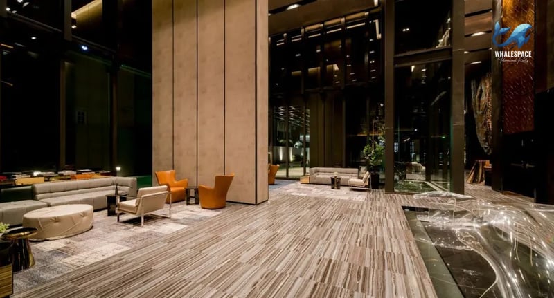 Elegant lobby with modern seating arrangements and a water feature