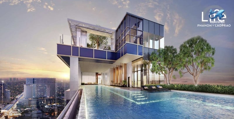 Stunning infinity pool on a high floor overlooking the cityscape at sunset