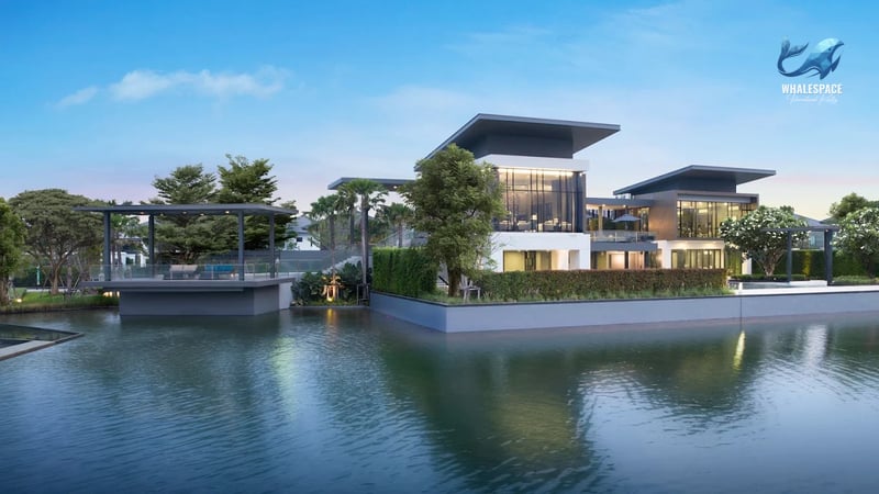 Modern architectural house design with large windows overlooking a serene lake, surrounded by lush greenery.