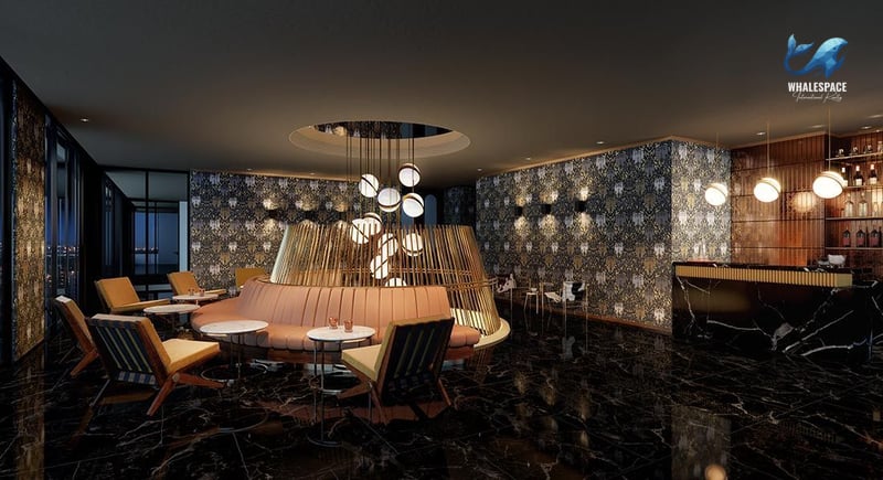 Sophisticated residents' lounge with dark marble floors, patterned walls, and plush seating around a central circular bar area.