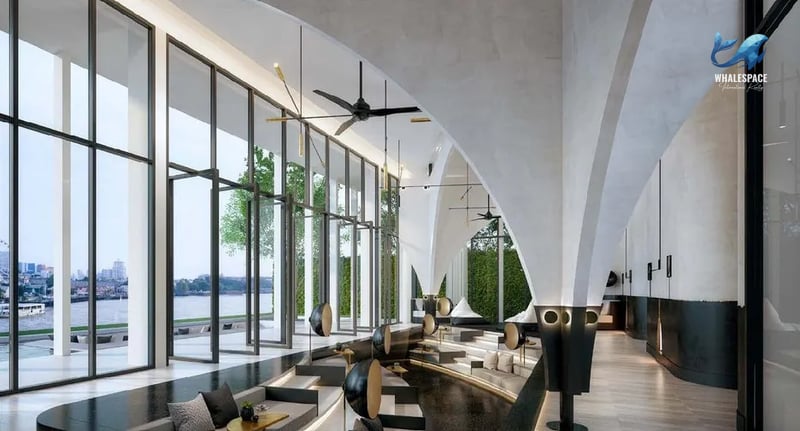 Chic lounge area with tiered seating, designer lighting, and panoramic river views.