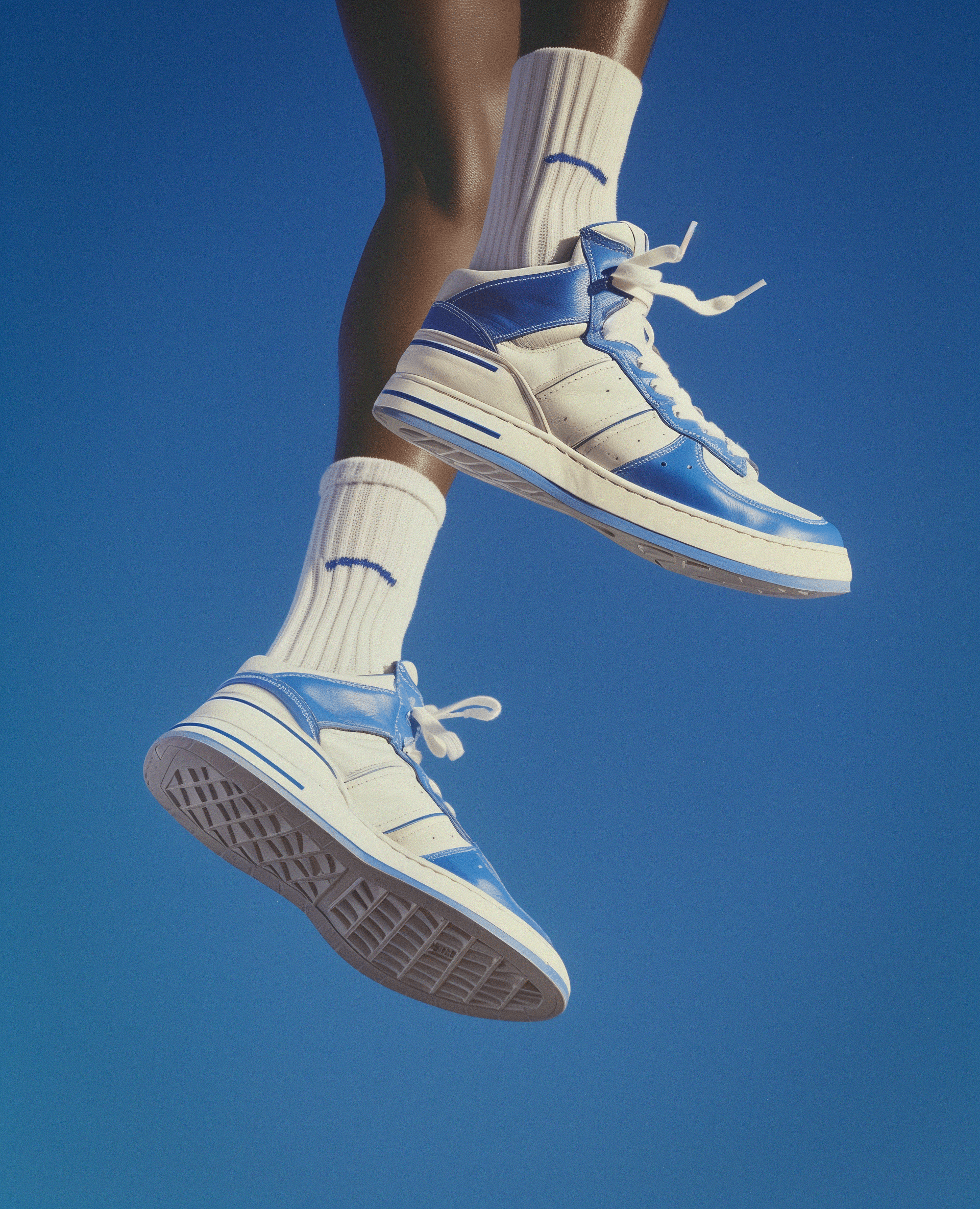 white and blue high top shoes
