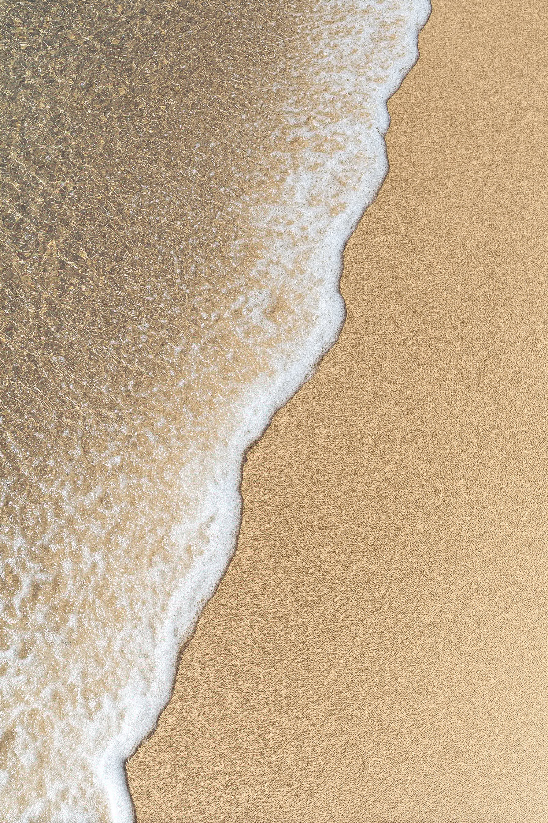 Shoreline meets golden sand