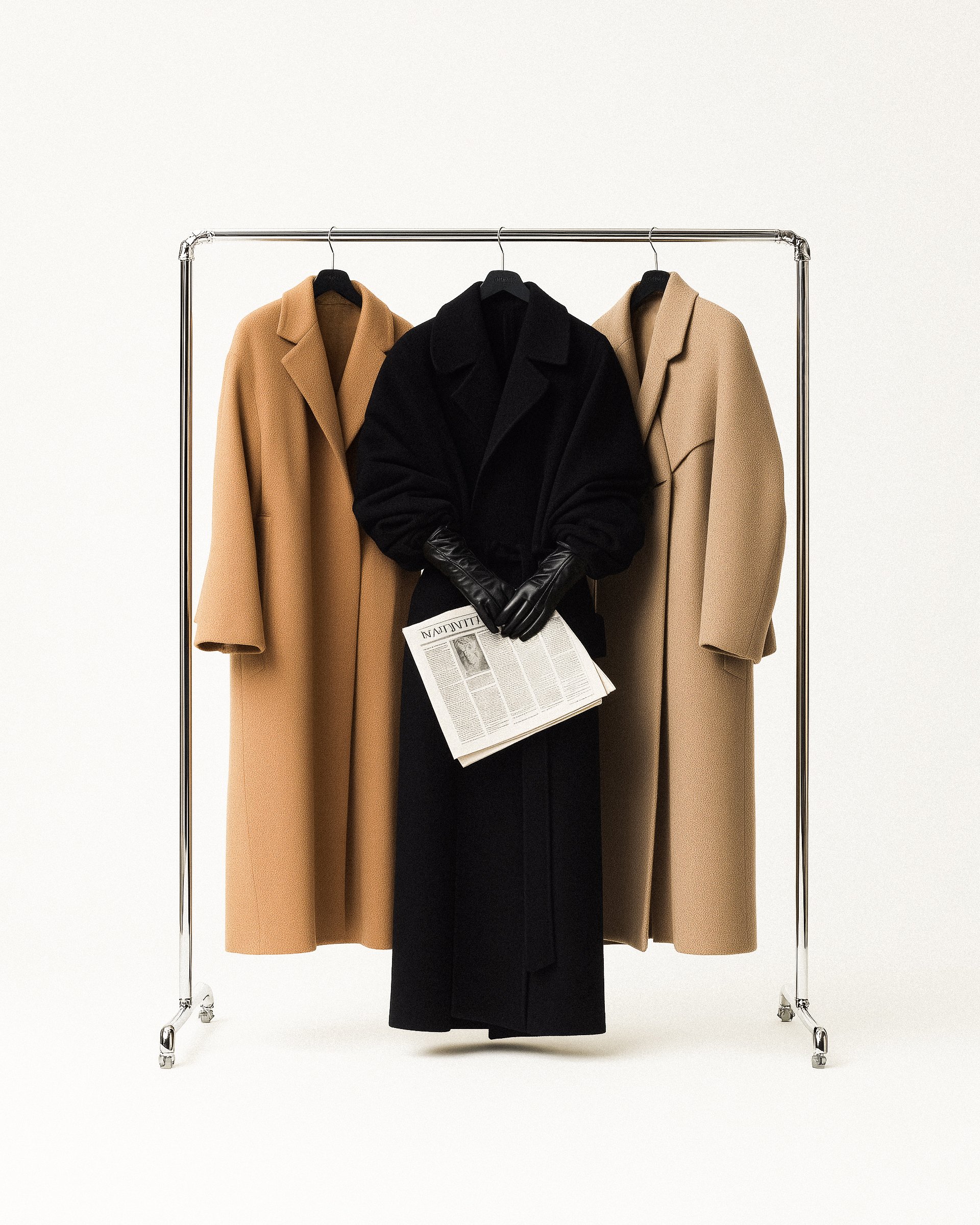 Coat holding newspaper