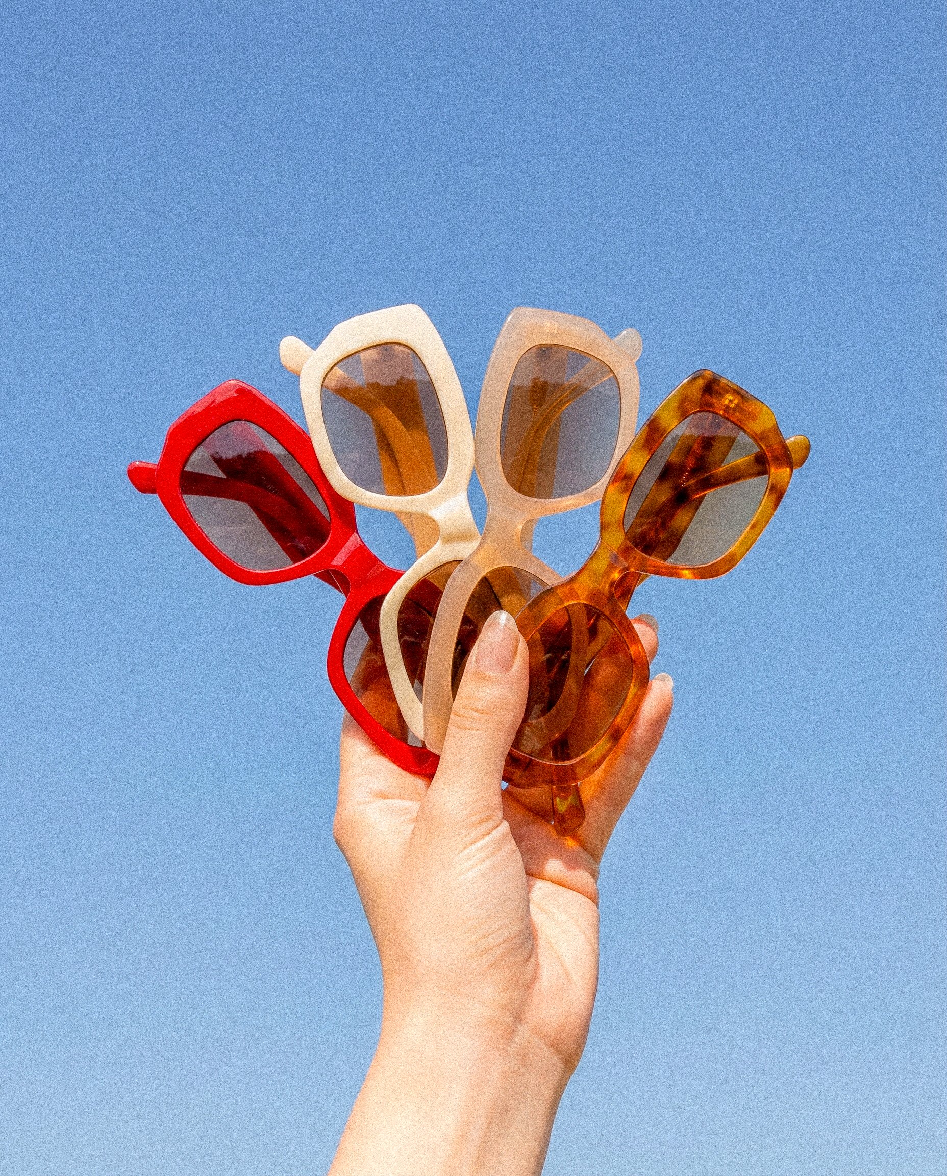 Colorful Sunglasses Hand Shot