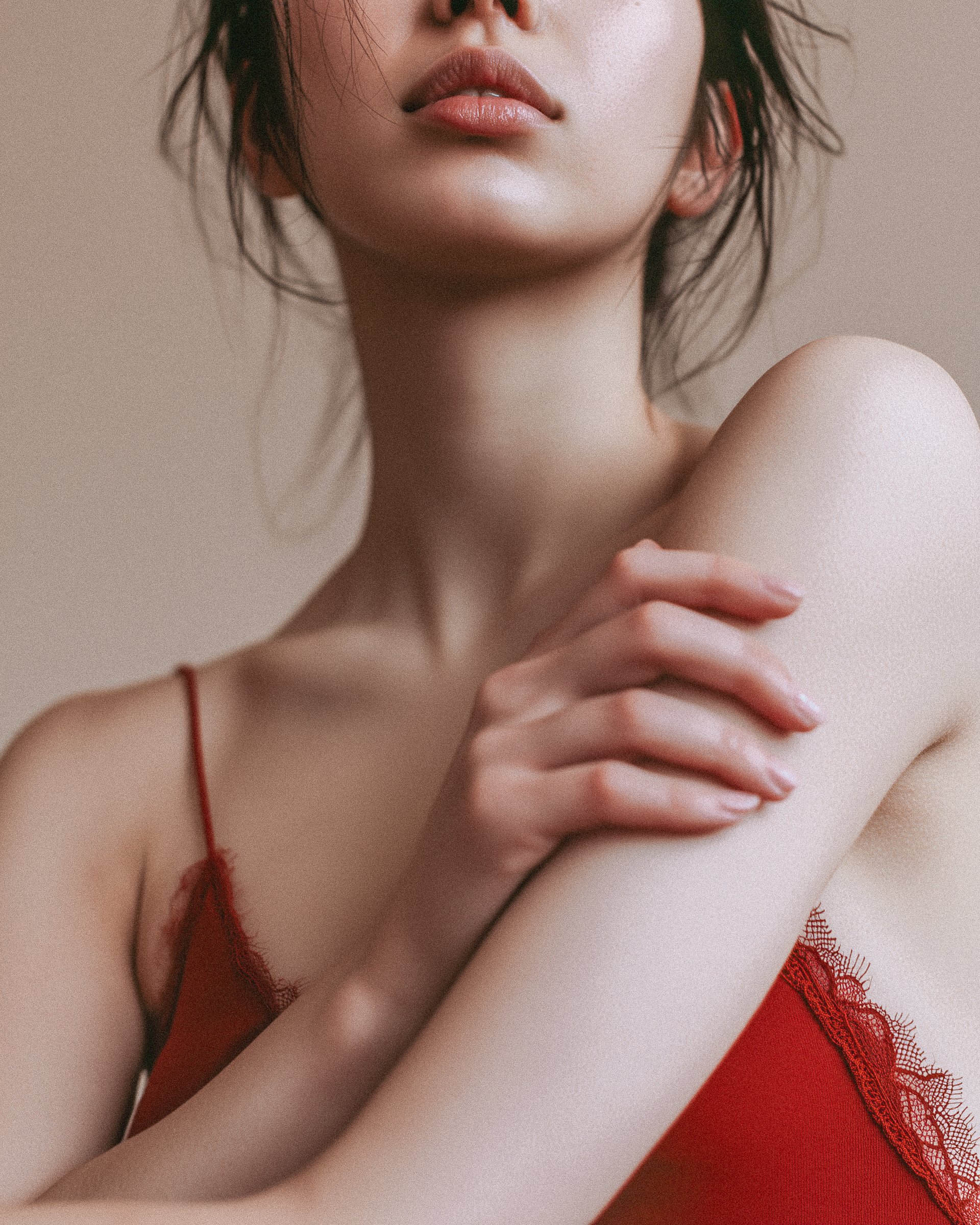 Woman Touching Bare Shoulder